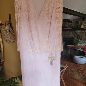 Elegant Pink Lace Dress with Floral Accent